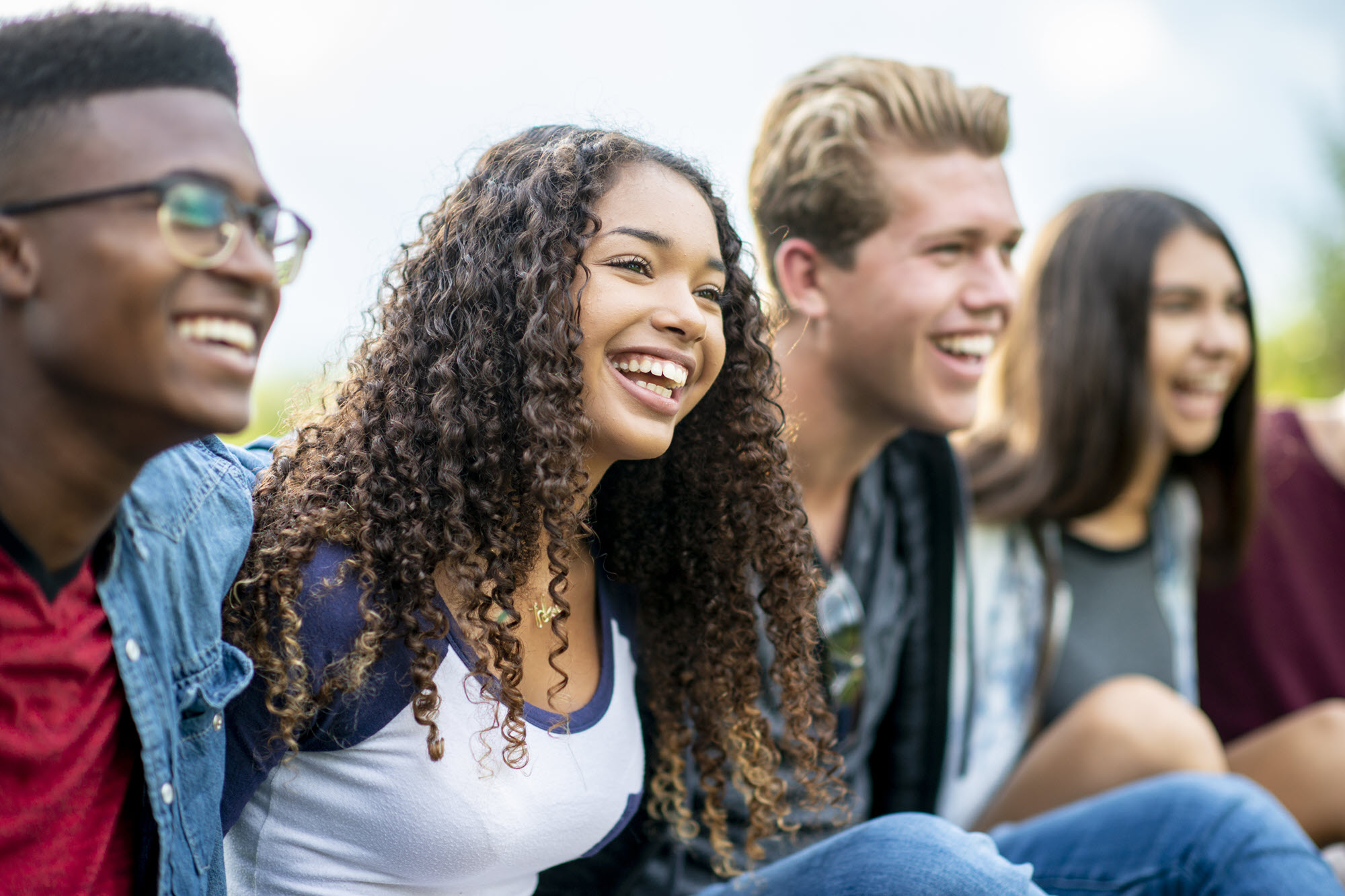 high school kids sitting and smiling